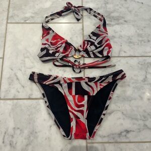 Ulu Red and Black Patterned Bikini. Has a stain on the top.